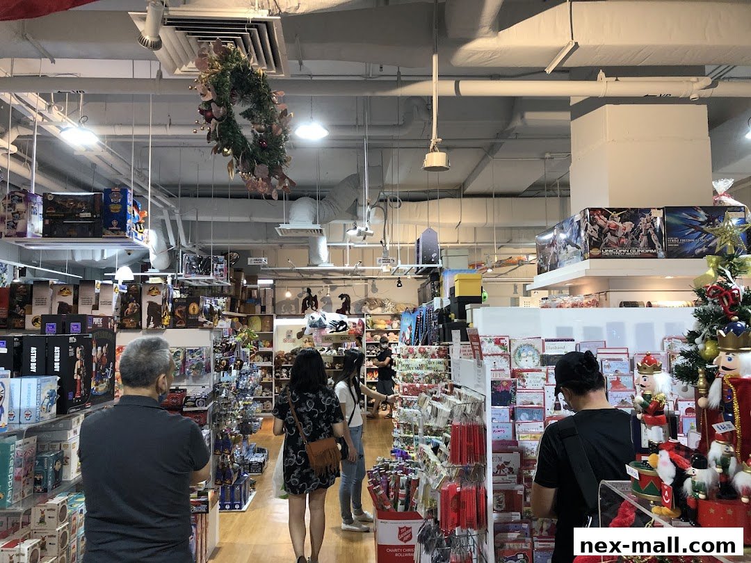 Interior view of a gift shop with various toys, cards, and festive decorations.