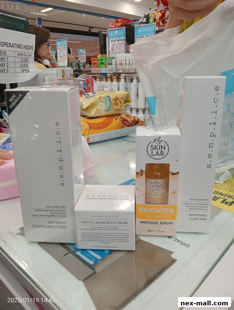 Various skincare products from S.E.M.P.L.I.C.E and My Skin Lab are displayed on a counter.