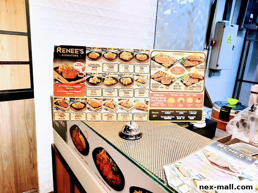 A menu board displaying various dishes and combos from Renee's Signature.