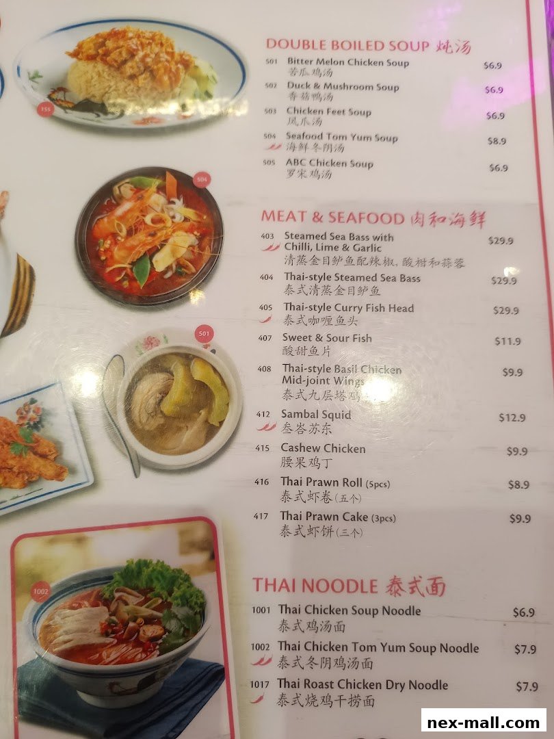 A menu from Go-Ang Pratunam Chicken Rice featuring soups, meat, seafood, and noodle dishes.