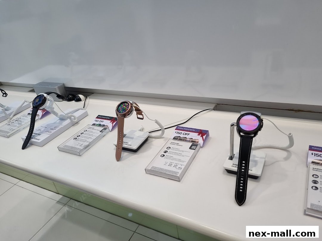 Samsung Galaxy watches displayed on stands with promotional information.