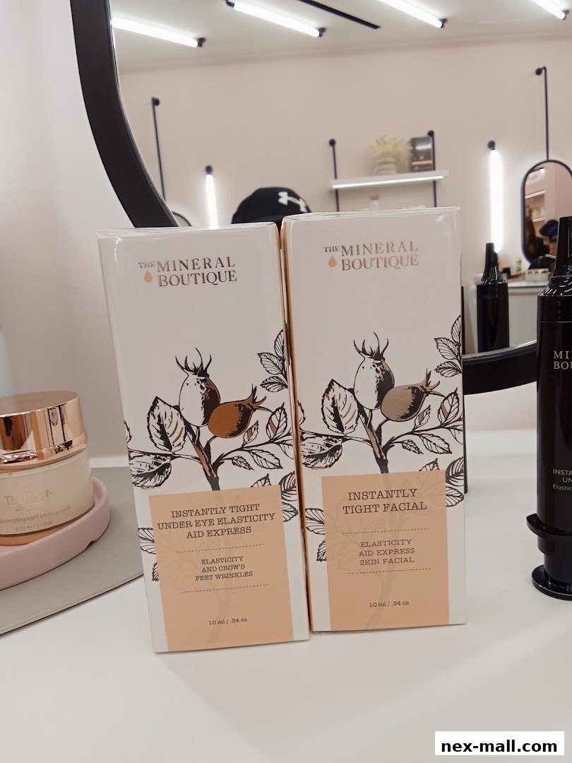 Two product boxes from The Mineral Boutique, featuring botanical illustrations and skincare claims.
