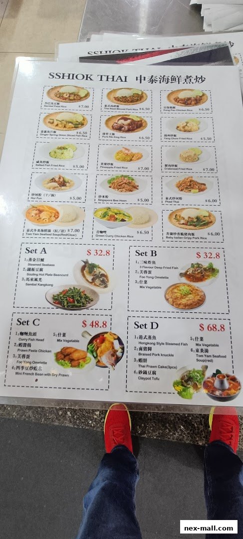 A menu from Shiok Thai restaurant featuring various set meals and individual dishes.