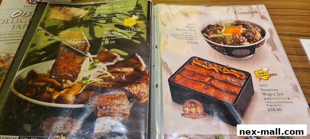 A menu from Aburi-EN Nex showcasing premium wagyu dishes like Wagyu Karubi Don and Premium Wagyu Jyu.