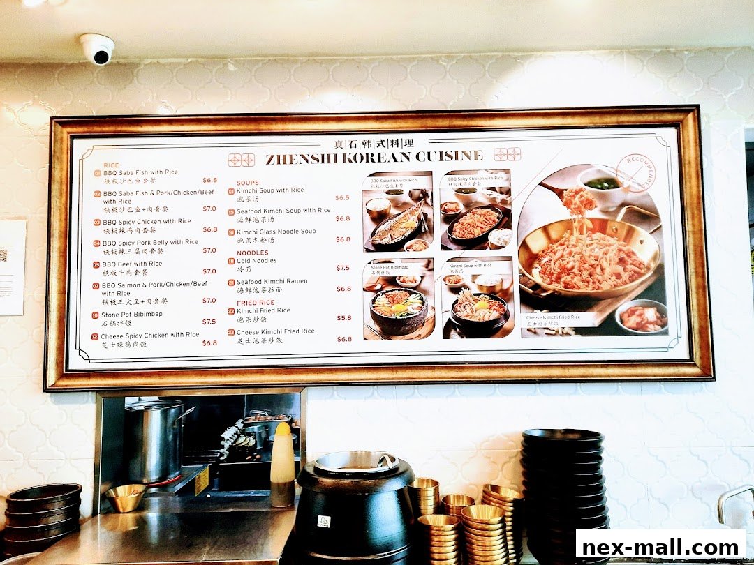 A framed menu for Zhenshi Korean Cuisine featuring various rice, soup, noodle, and fried rice dishes.