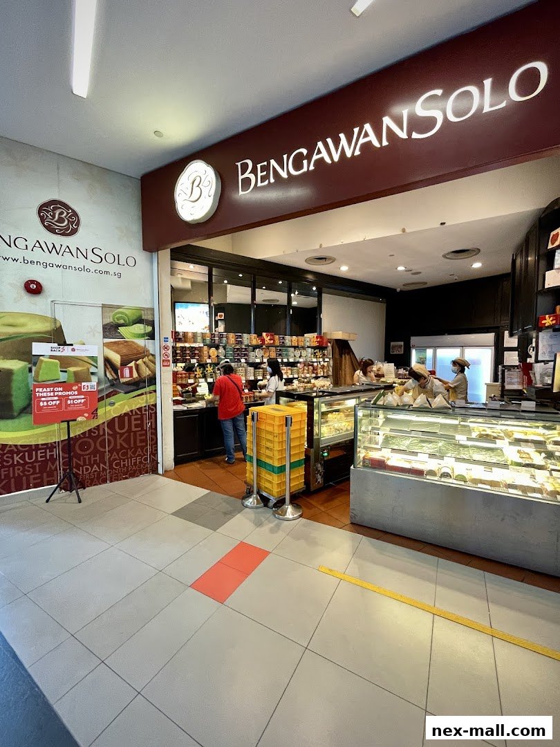 The entrance to Bengawan Solo, a shop selling cakes and cookies, with displays of their products.
