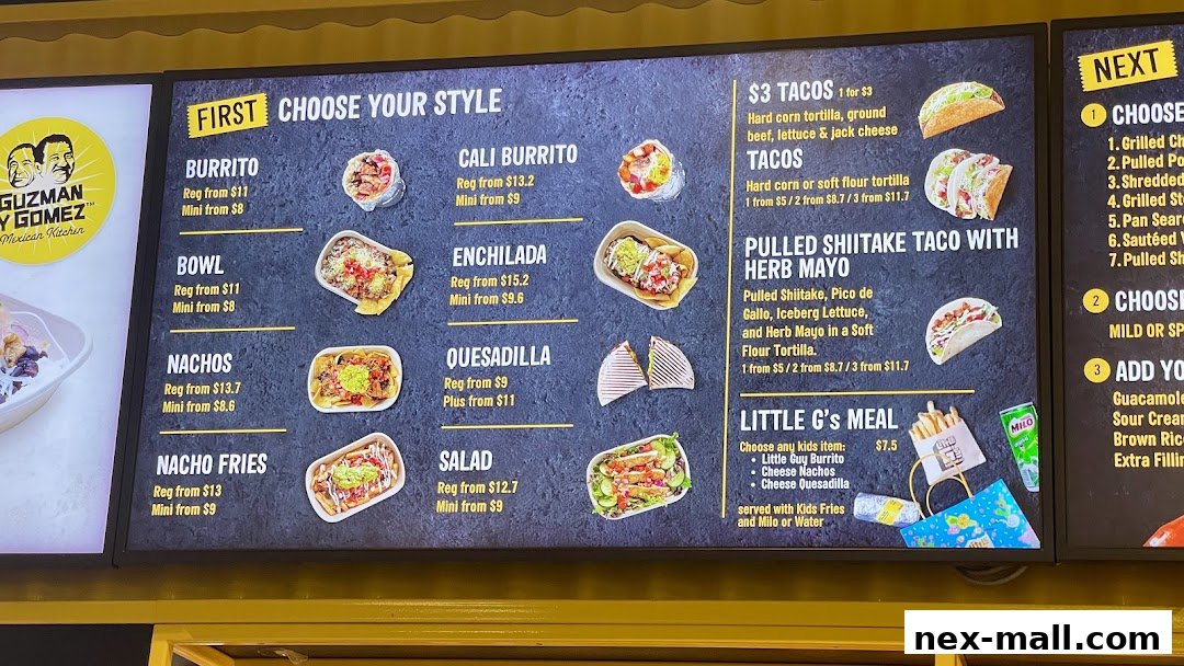 A digital menu board for Guzman y Gomez, showcasing various Mexican food items and their prices.