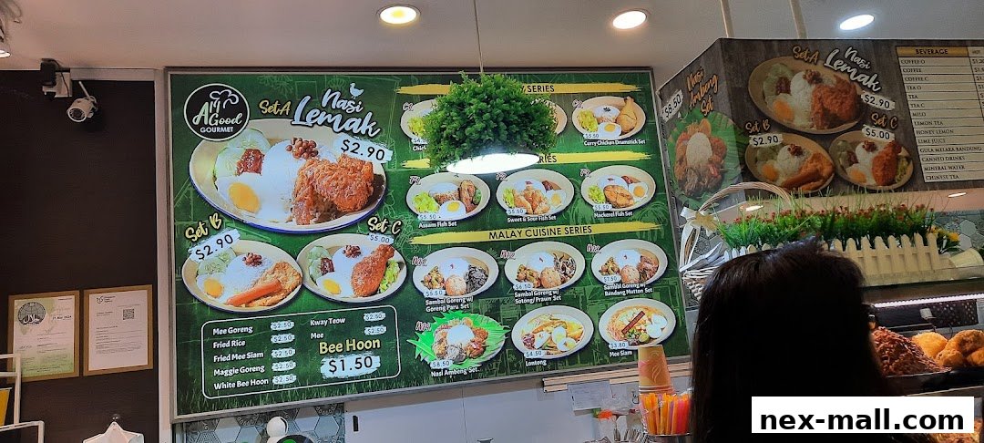A menu board displaying various Nasi Lemak sets and other Malay cuisine dishes with prices.