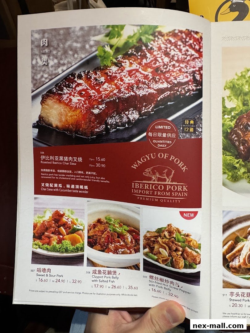 A menu page featuring a close-up of roasted pork belly and other pork dishes.