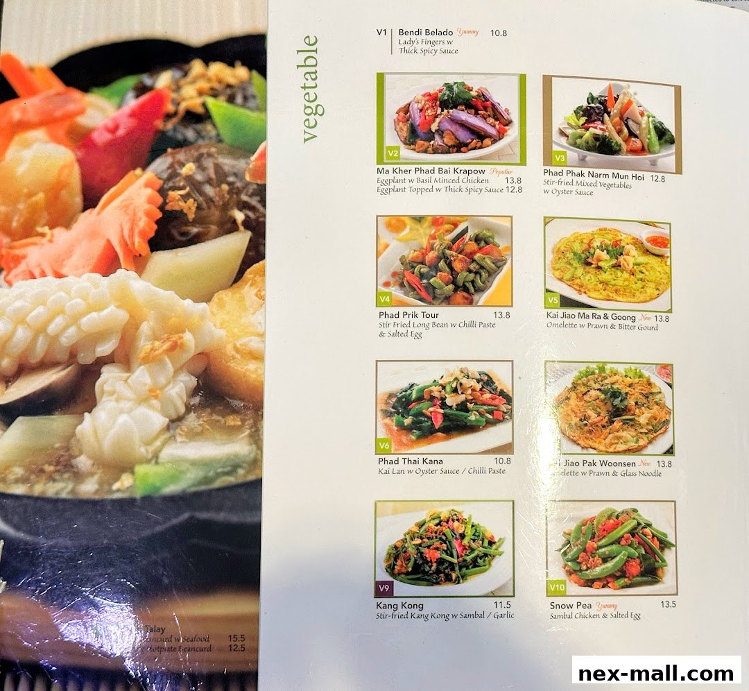 A menu page from Bali Thai NEX featuring various vegetable dishes with images and descriptions.