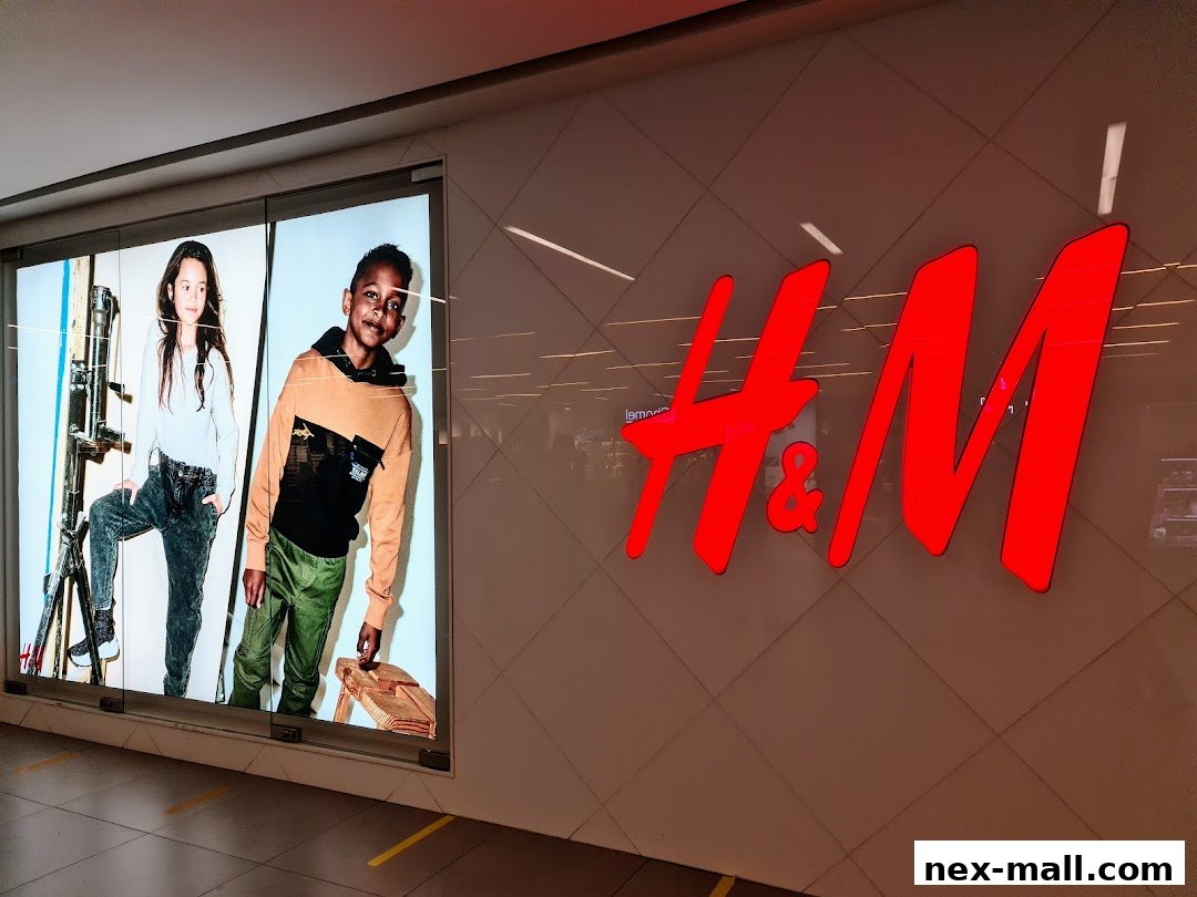 The H&M store logo is displayed prominently with fashion imagery of children.