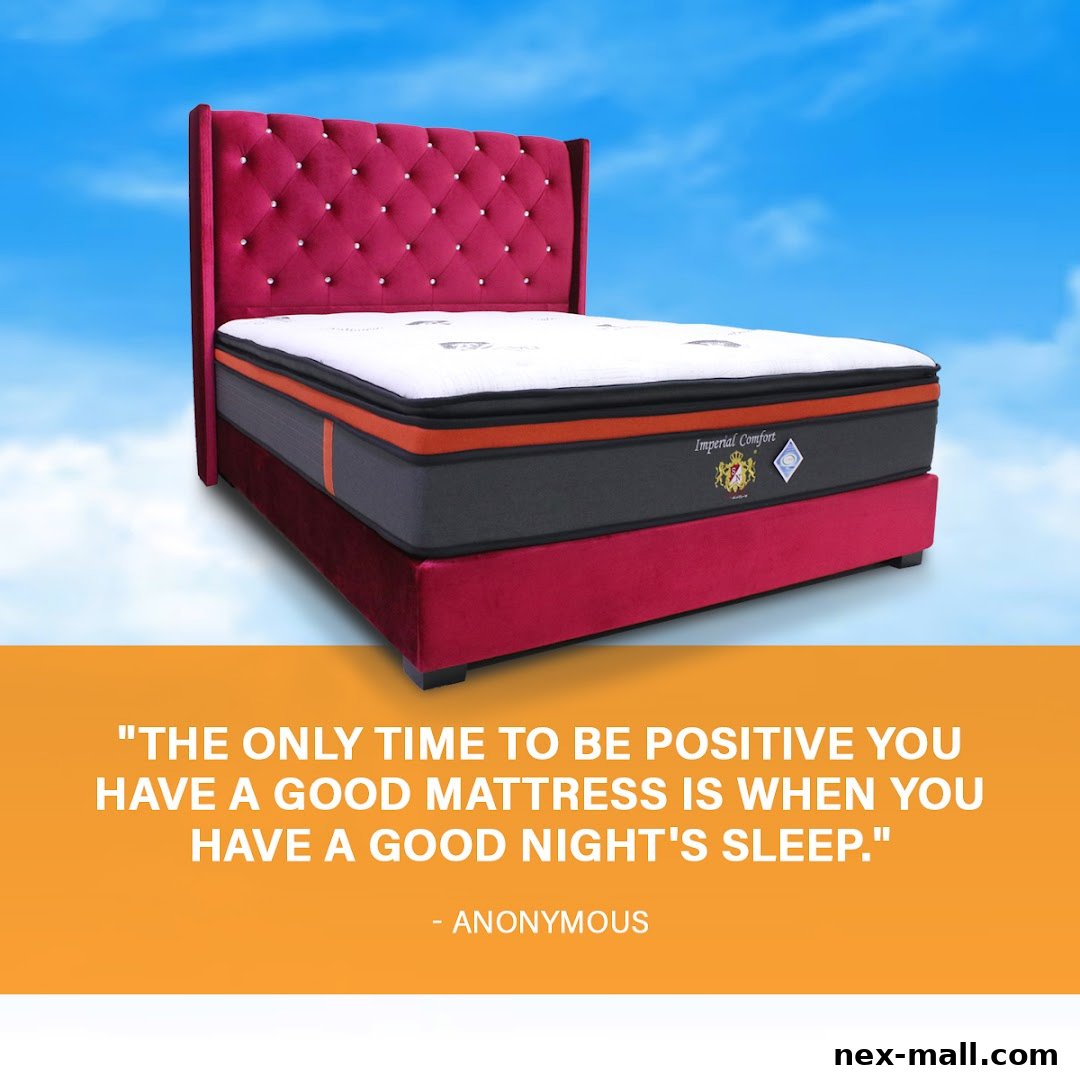 A luxurious red velvet bed frame with a tufted headboard and a premium mattress.