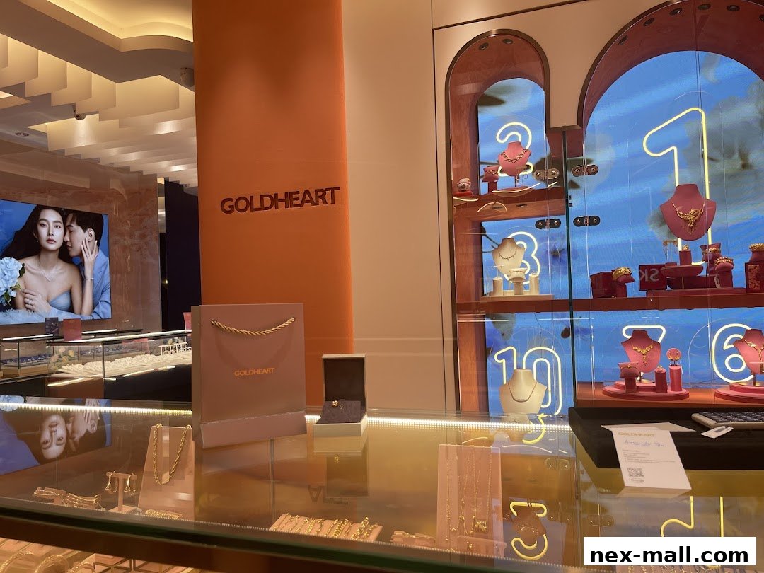 Goldheart Jewelry store interior with displays of necklaces, earrings, and a promotional image.