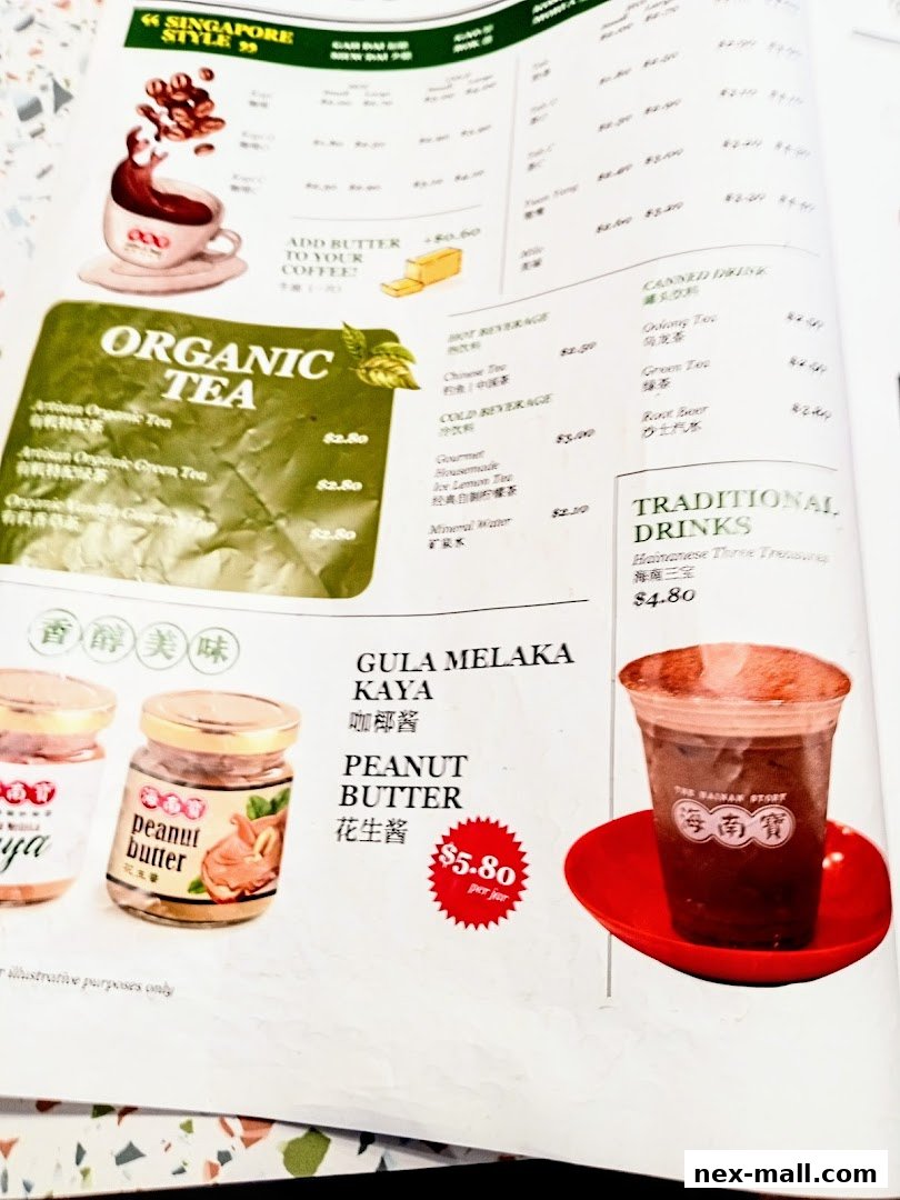 A menu from The Hainan Story Coffee House Nex featuring organic teas, beverages, and traditional drinks.