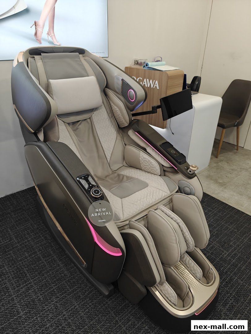 A luxurious OGAWA massage chair with a 'New Arrival' tag displayed.
