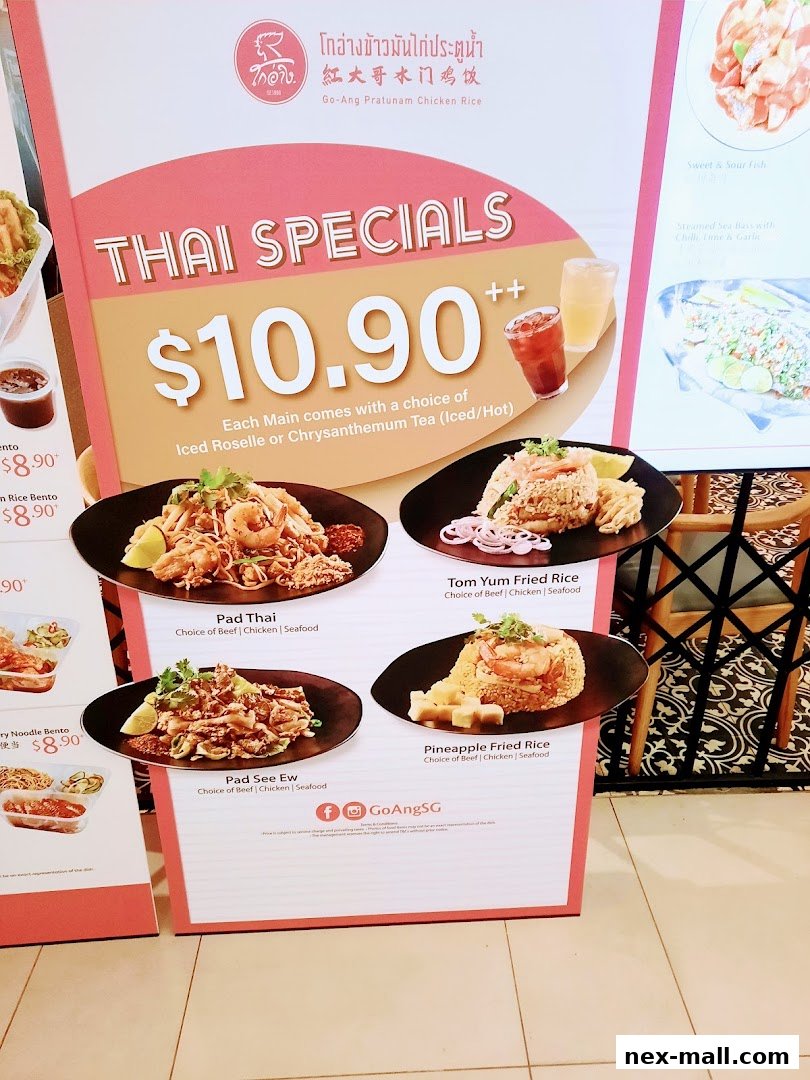 A menu board showcasing Thai specials with various dishes and drinks.