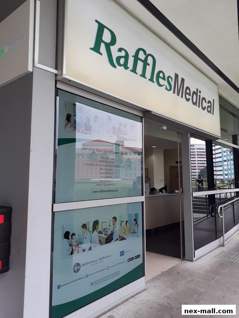 The exterior of Raffles Medical clinic, showcasing its services and branding.