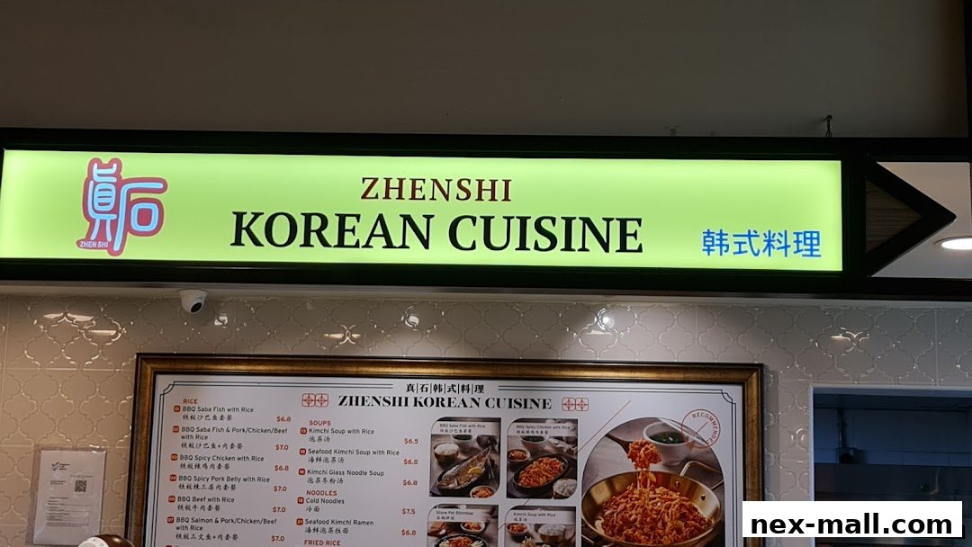 A menu board for Zhenshi Korean Cuisine, featuring various rice dishes, soups, noodles, and fried rice.