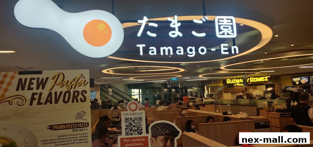 The Tamago-En NEX restaurant interior with a sign advertising new pasta flavors.