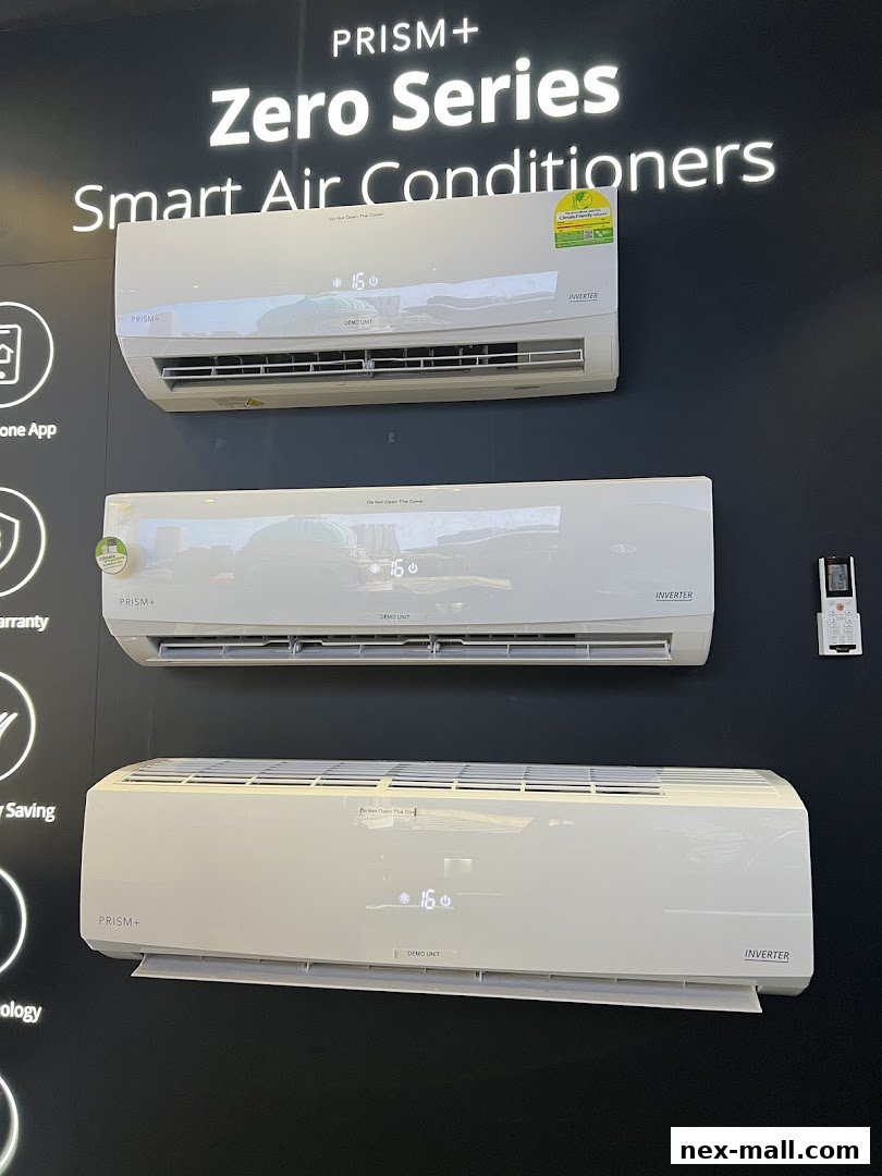 Three PRISM+ Zero Series smart air conditioners displayed on a dark wall.