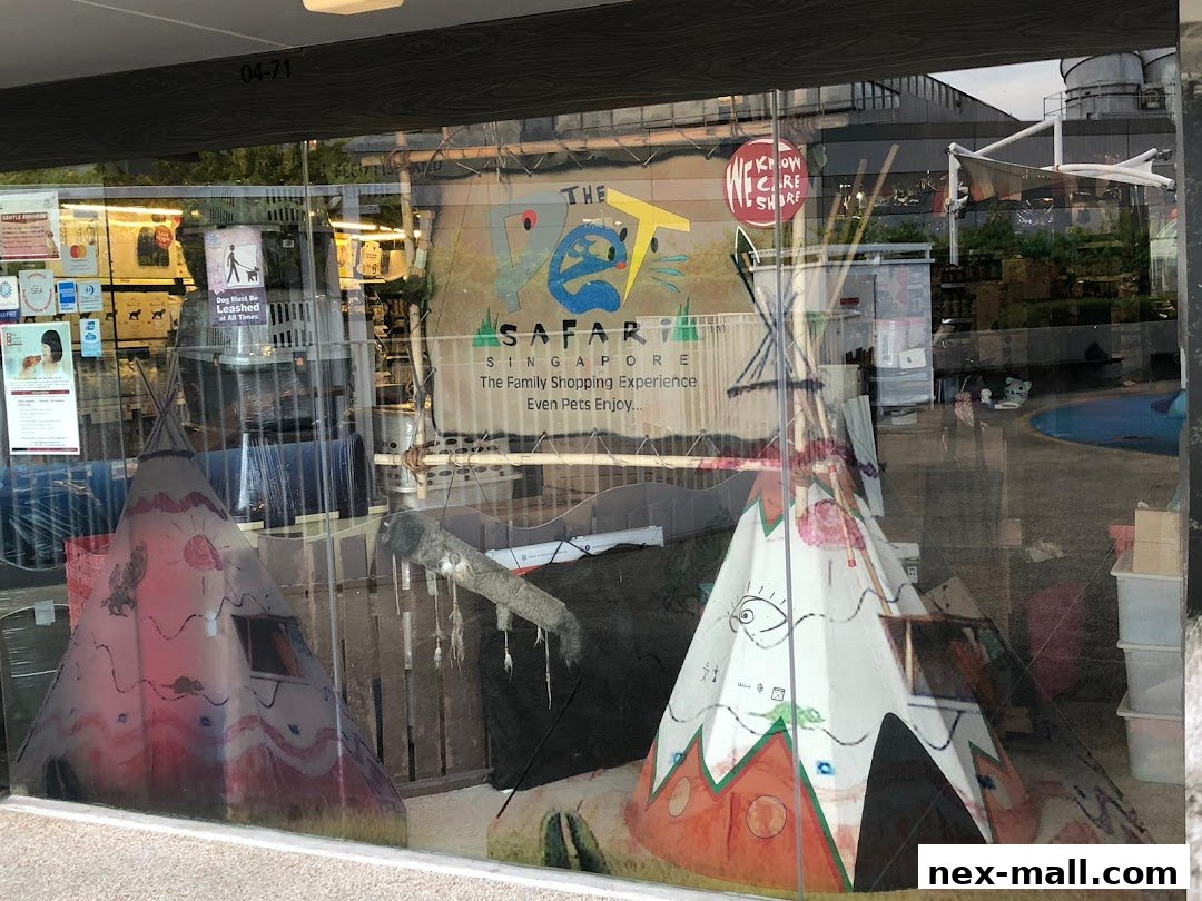 The Pet Safari shop front with teepee displays and promotional signage visible through the window.
