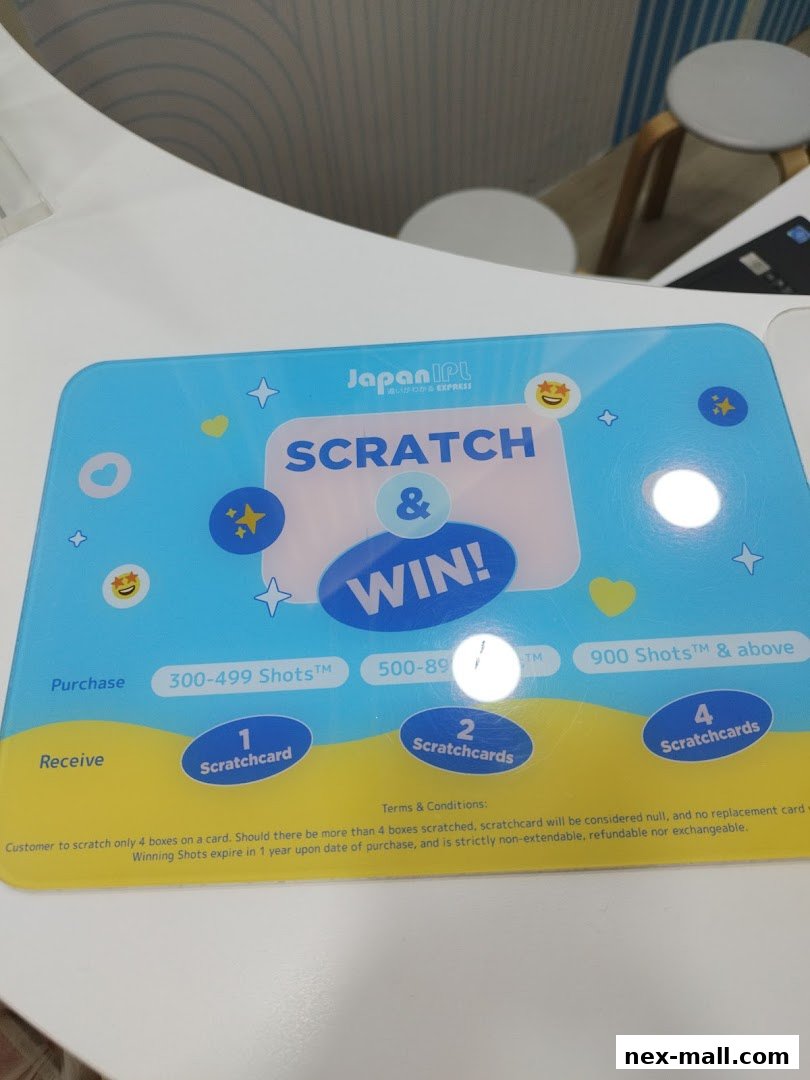 A promotional scratch and win card for Japan IPL Express with purchase tiers and rewards.