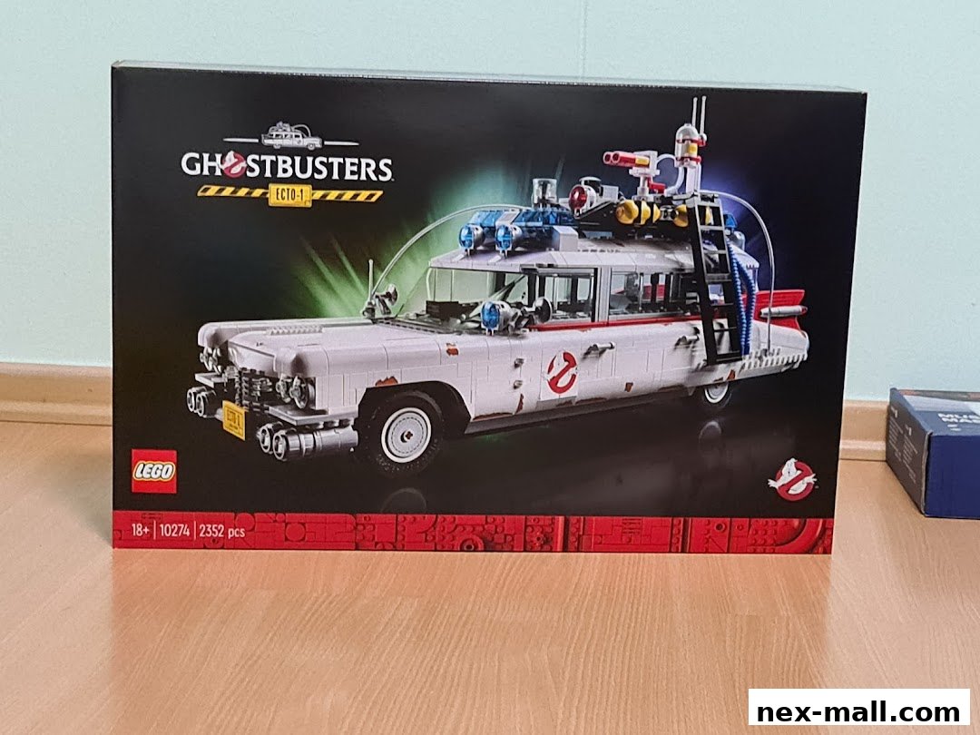 A LEGO Ghostbusters Ecto-1 set box is displayed on a wooden floor.