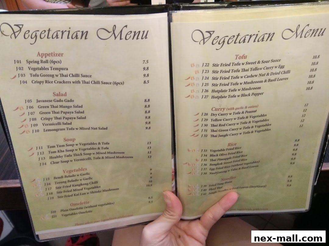 A vegetarian menu from Bali Thai NEX with appetizers, salads, soups, vegetables, tofu, curry, rice, and noodles.