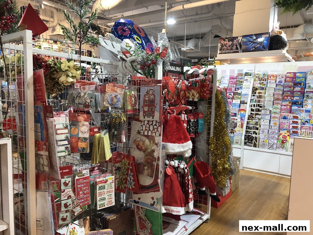 A shop interior filled with Christmas decorations, cards, and festive apparel.