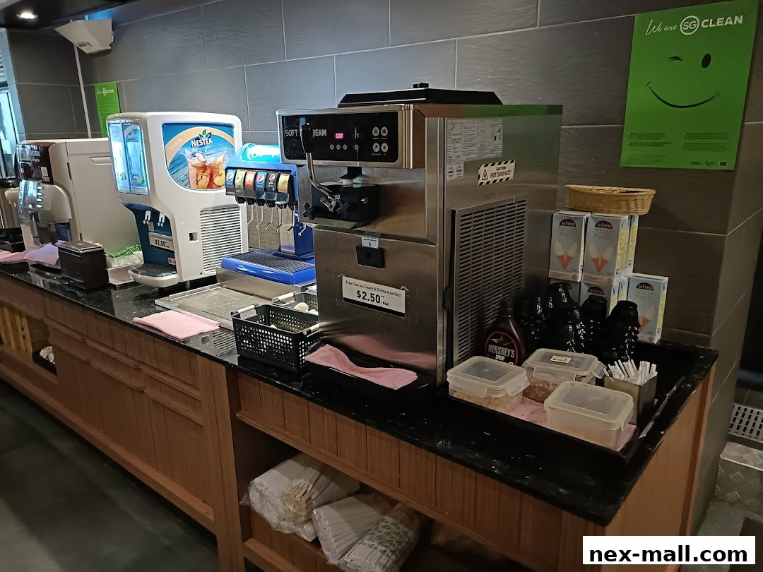 Beverage dispensers and condiments are neatly arranged on a counter at Shabu Sai.