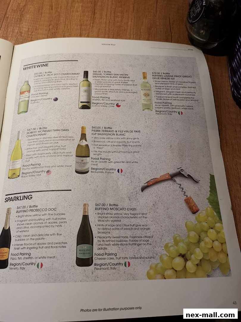 A wine menu featuring white and sparkling wines with descriptions and prices.