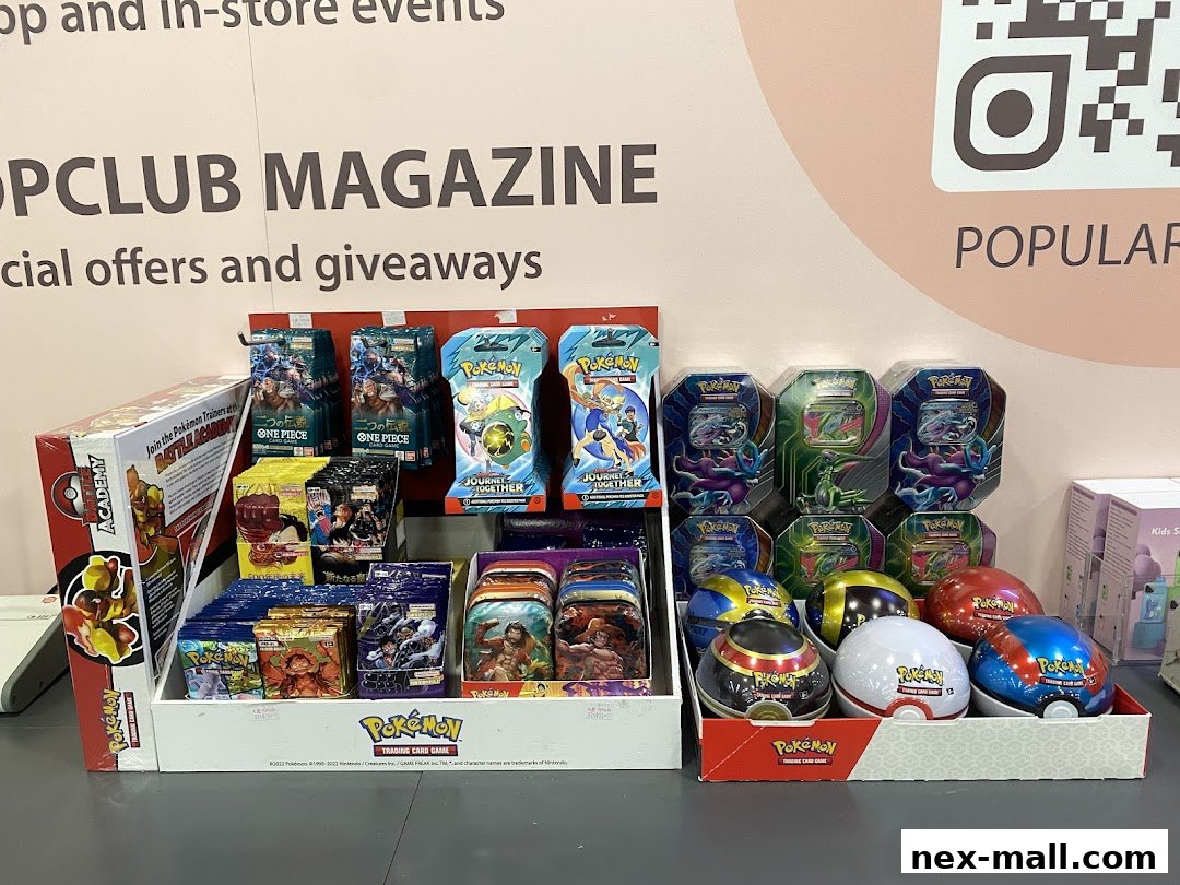 A display of various Pokémon trading card game products, including booster packs and tins.