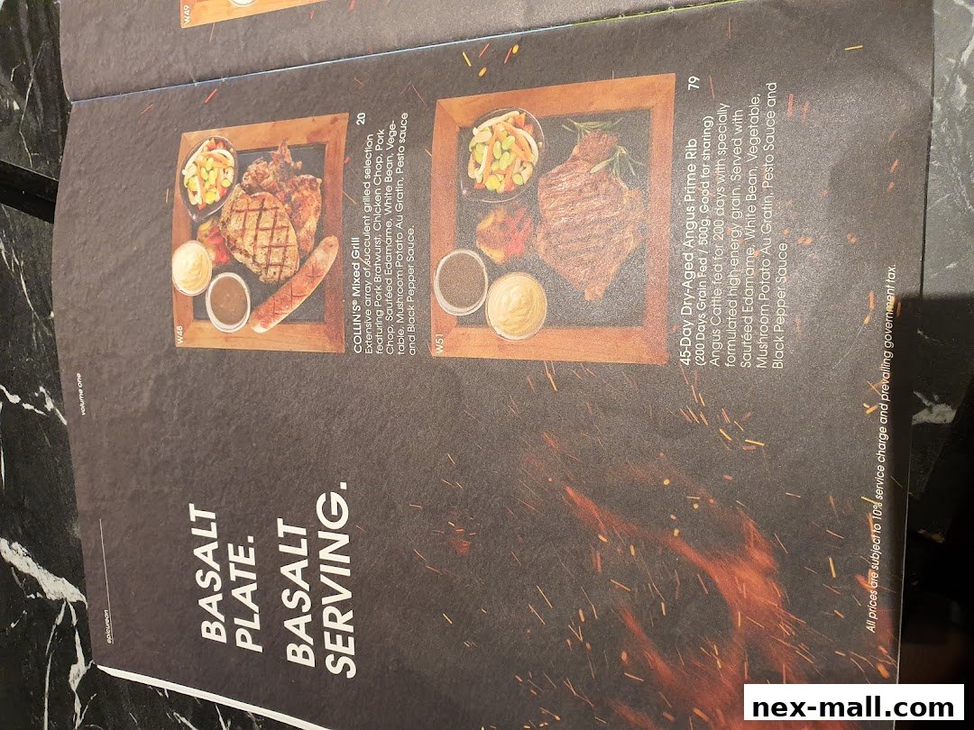 A menu featuring grilled meat dishes, including a mixed grill and dry-aged Angus prime rib.