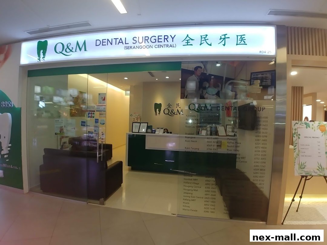 The exterior of Q&M Dental Surgery Serangoon, featuring a clean and modern storefront with glass doors and signage.