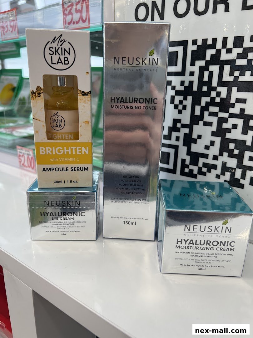 A display of skincare products including serum, toner, eye cream, and moisturizer.
