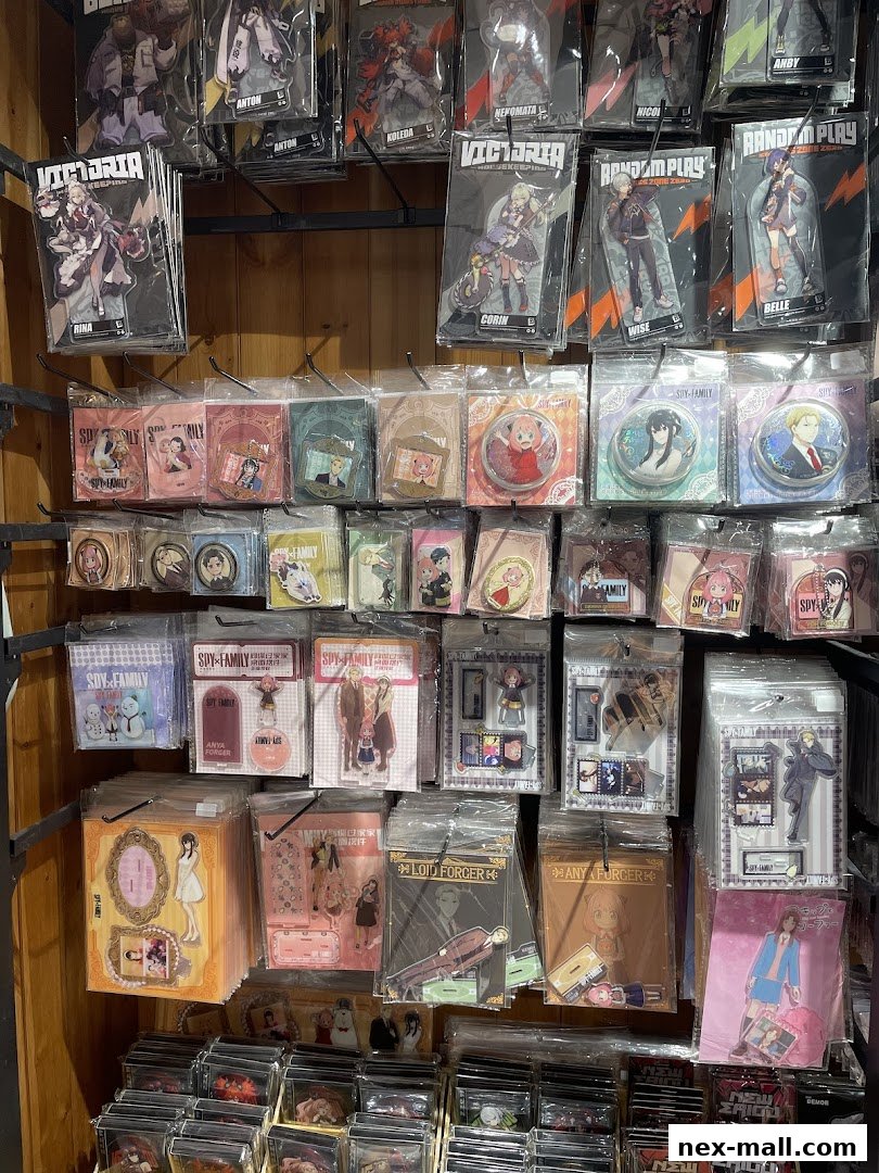 A wall display filled with anime merchandise, including acrylic stands and character keychains.