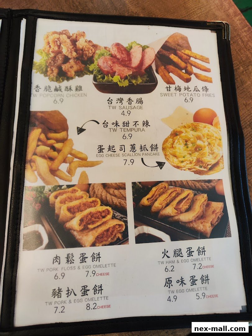 A menu from Fong Sheng Hao 豐盛號 Nex featuring various Taiwanese snacks and omelettes with prices.