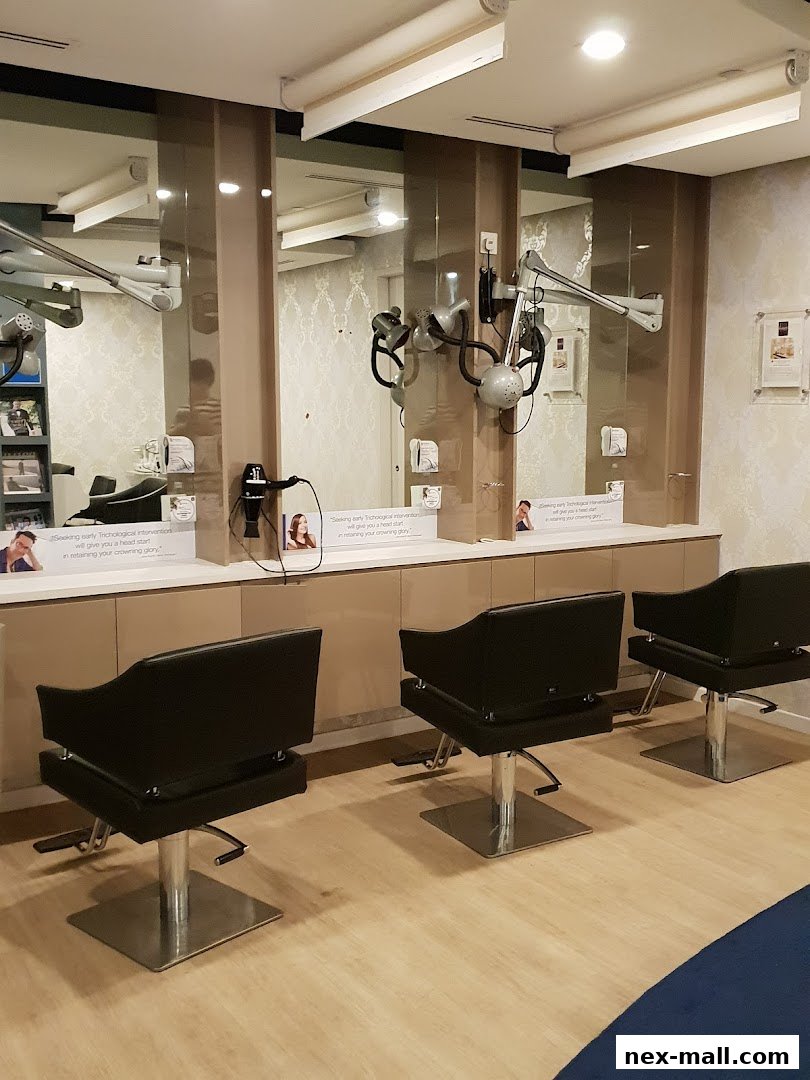 Interior of a hair loss treatment salon with chairs and scalp treatment equipment.