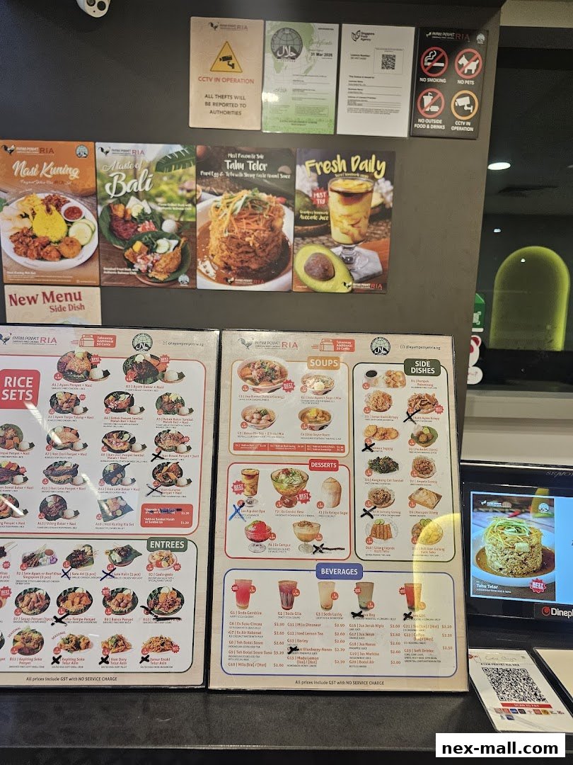 A menu board displaying various Indonesian dishes, drinks, and desserts with prices.