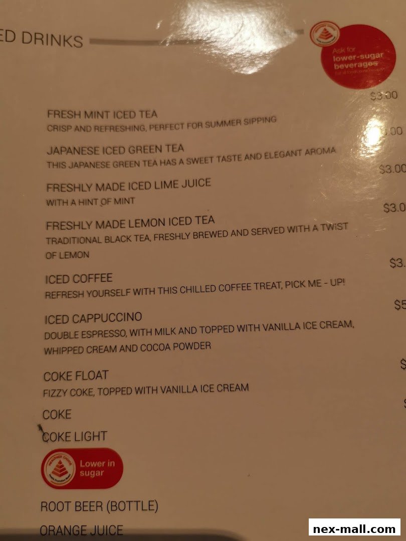 A menu featuring various iced drinks, including teas, coffee, and sodas, with prices and descriptions.