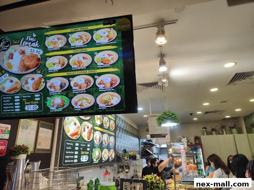 A digital menu board displays various Nasi Lemak and Malay cuisine sets with prices.