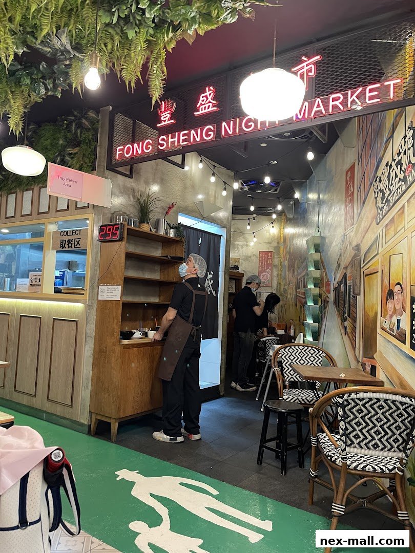 Interior of Fong Sheng Hao Night Market with staff and seating.