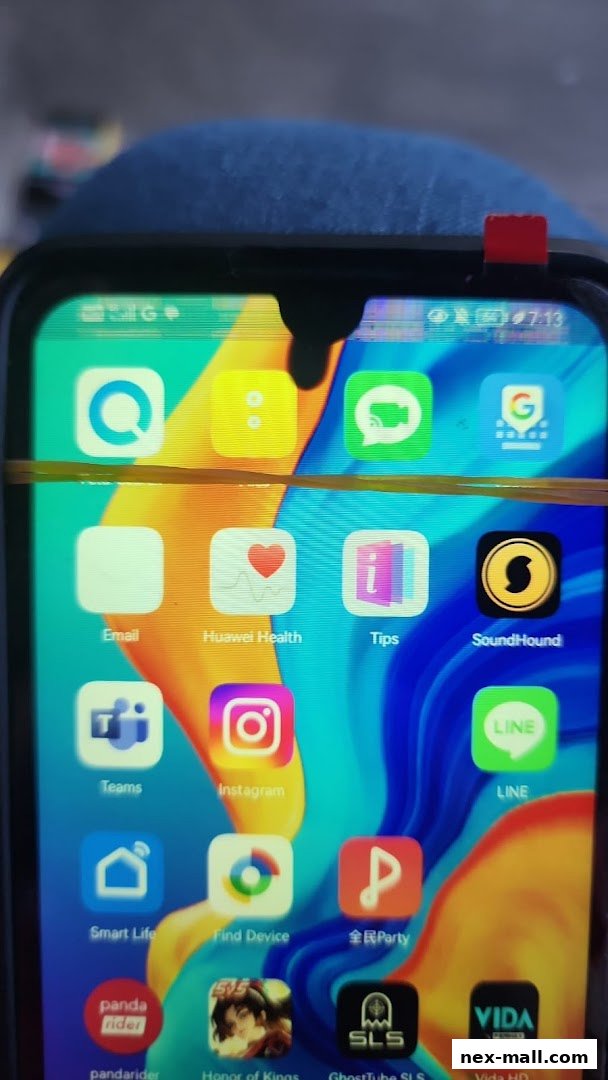 Close-up of a smartphone screen displaying various app icons and the time.