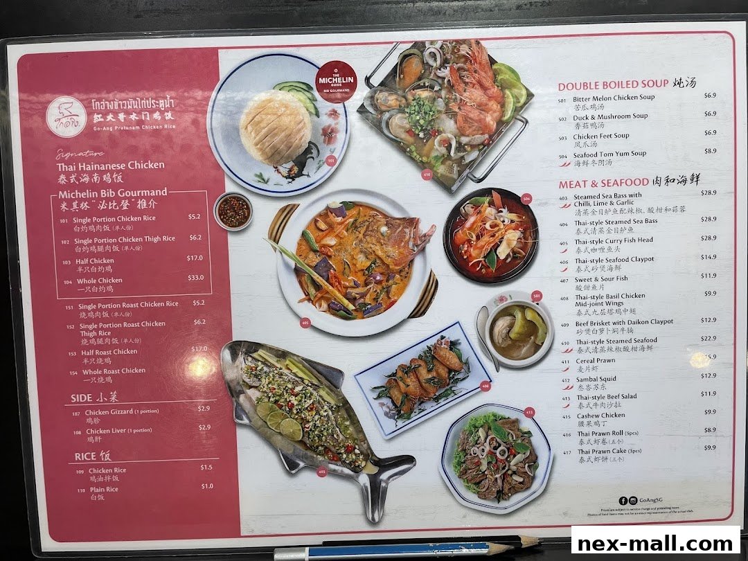 A menu from Go-Ang Pratunam Chicken Rice featuring various Thai dishes and soups.