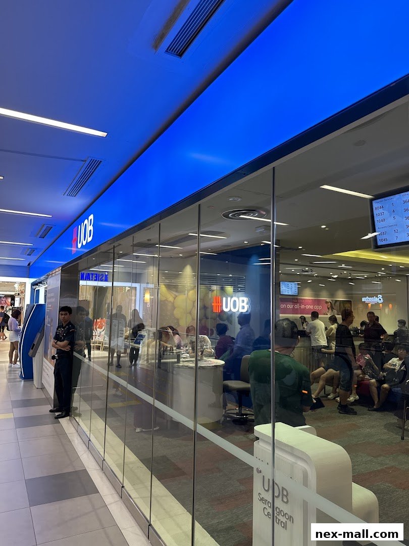 The UOB Serangoon Central branch with customers inside and a security guard at the entrance.