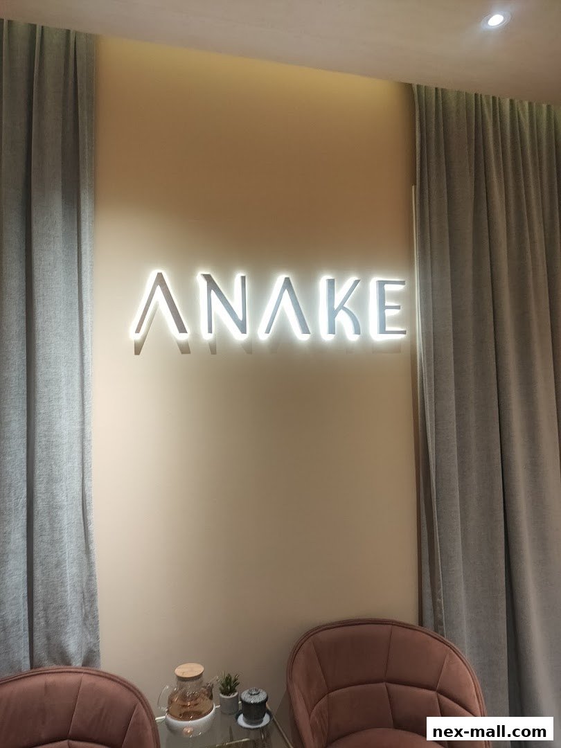 A well-lit interior shot of the Anake shop with its name displayed prominently.