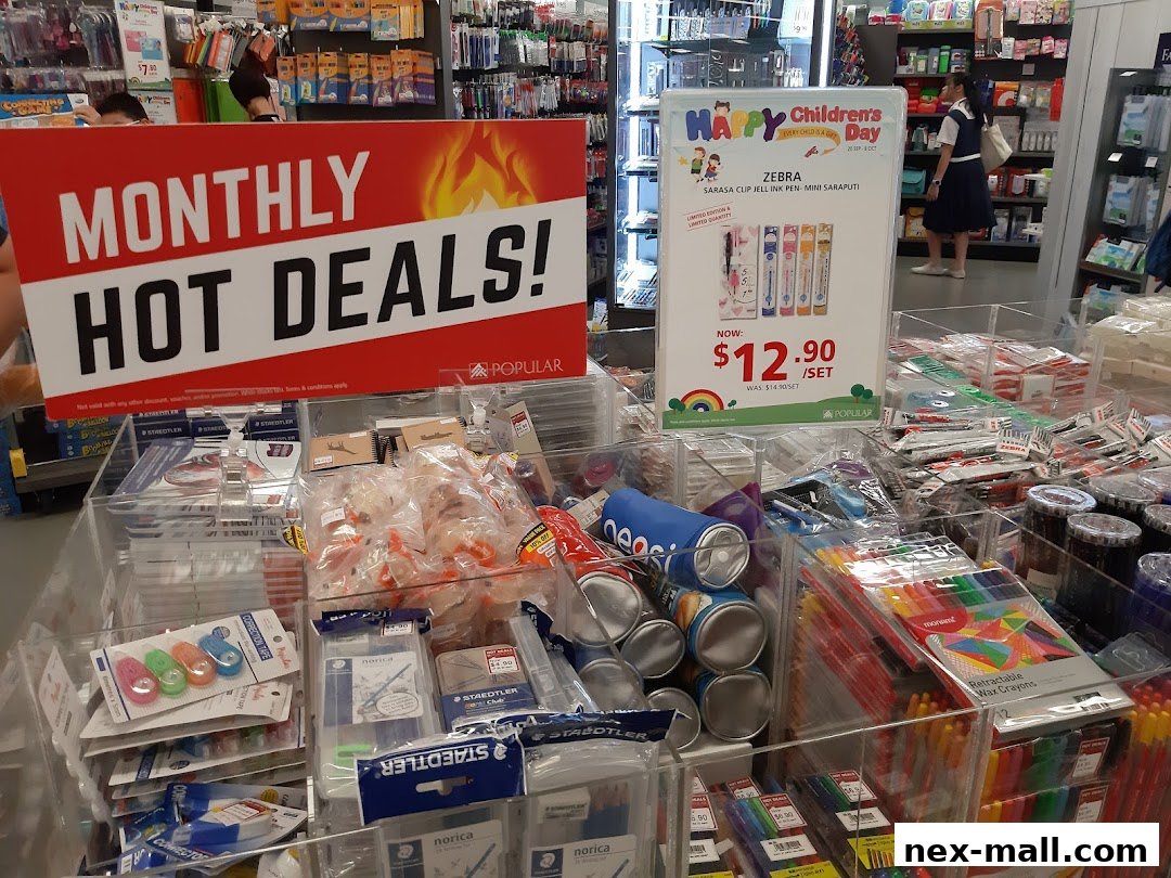 POPULAR Bookstore displays monthly hot deals and stationery items, including pens and crayons.