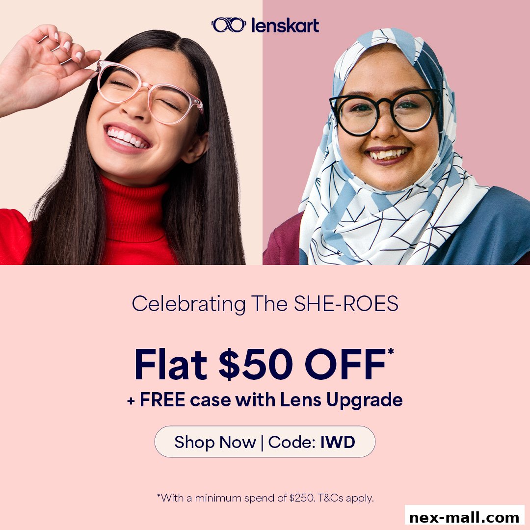Two women smiling, one wearing pink glasses and the other wearing black glasses and a hijab.