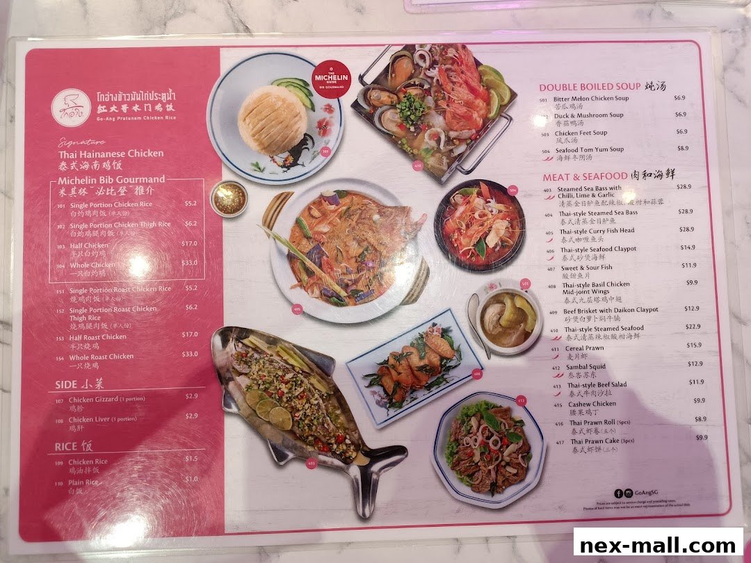A menu from Go-Ang Pratunam Chicken Rice featuring Thai Hainanese Chicken and other dishes.
