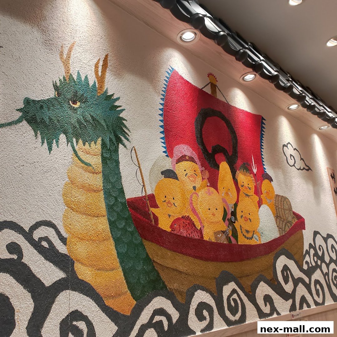 A vibrant mural depicting a dragon and a boat filled with cartoon characters.